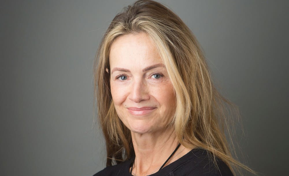 A portrait of Louise Moore.