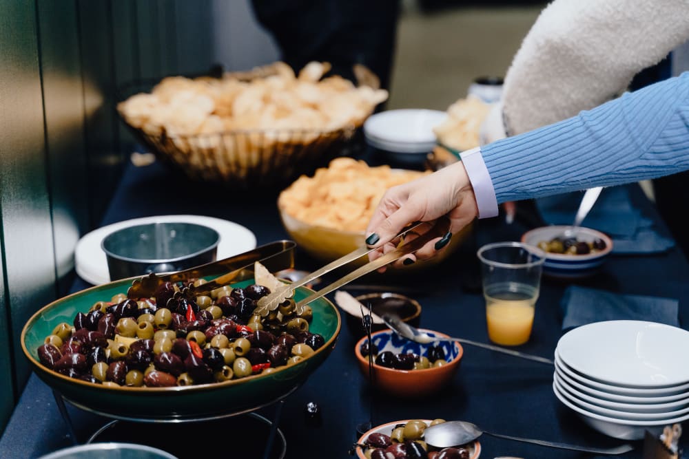 alumni event buffet - olives and crisps