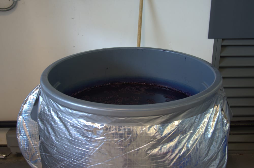 A grey barrel with deep blue Indigo inside.