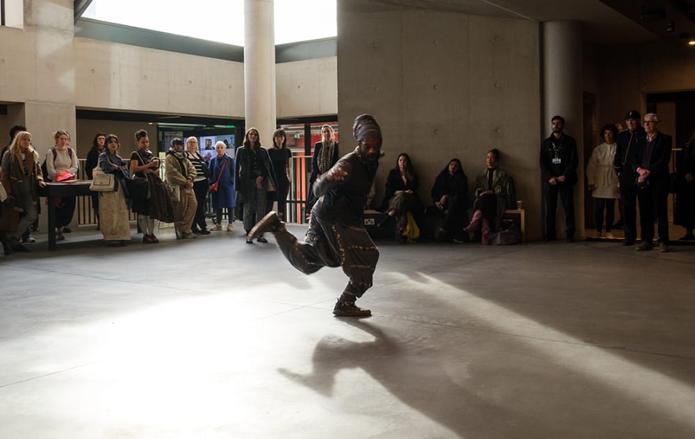 Interdisciplinary performer and maker Akeim Toussaint Buck performing at Imagining Possibilities Festival, April 2024. Photography by Aleks Faust.