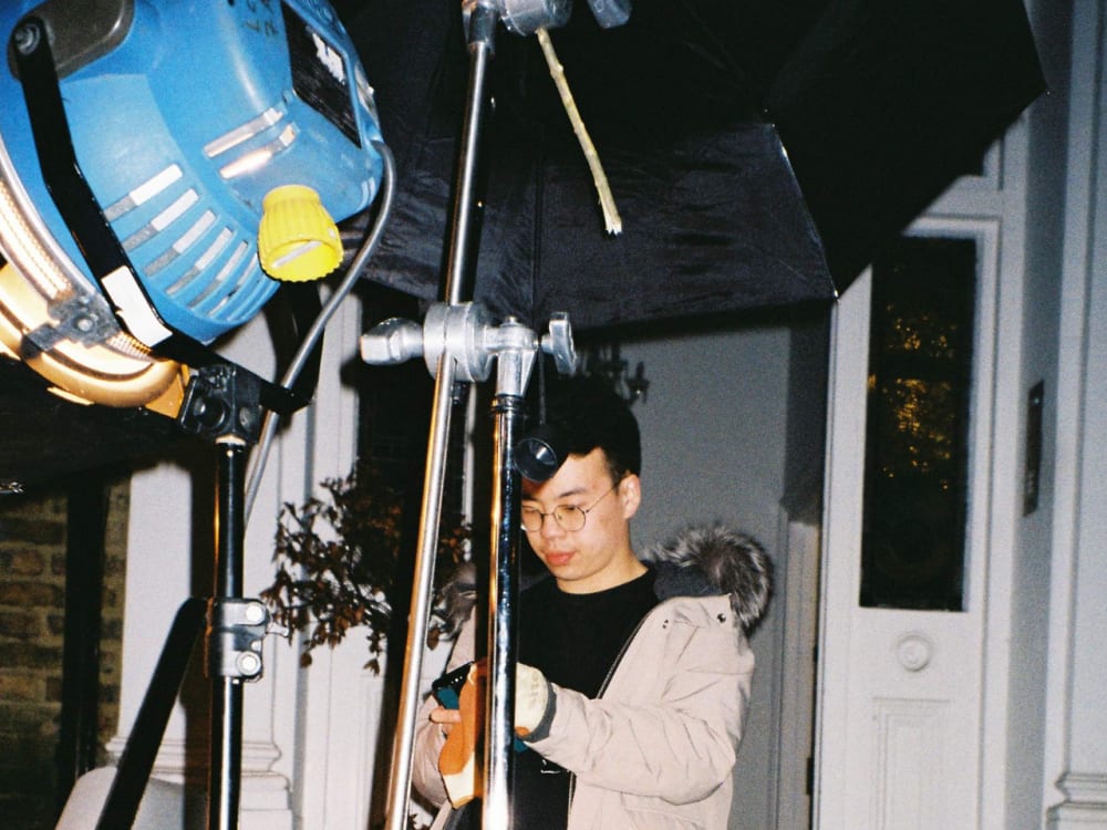 Student working with photography equipment