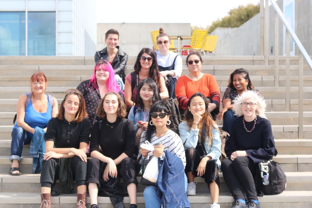 women sitting on steps of Margate's Turner Contemporarygallery