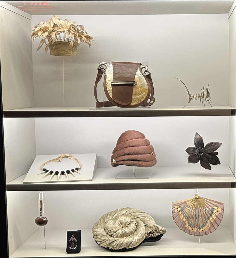 Cabinet with objects  - necklaces, hats on shelves