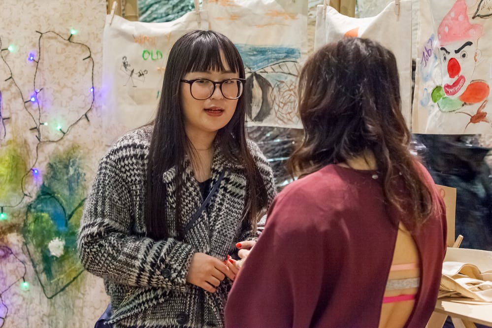 People talking at Applied Imagination Festival, CSM