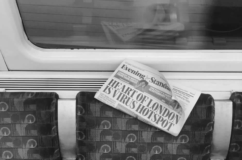 A newspaper on an Underground train.