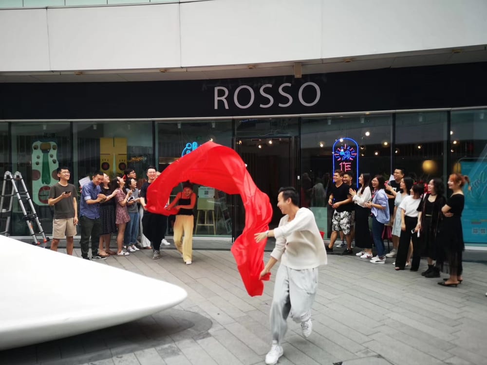 A group of people watching a performance
