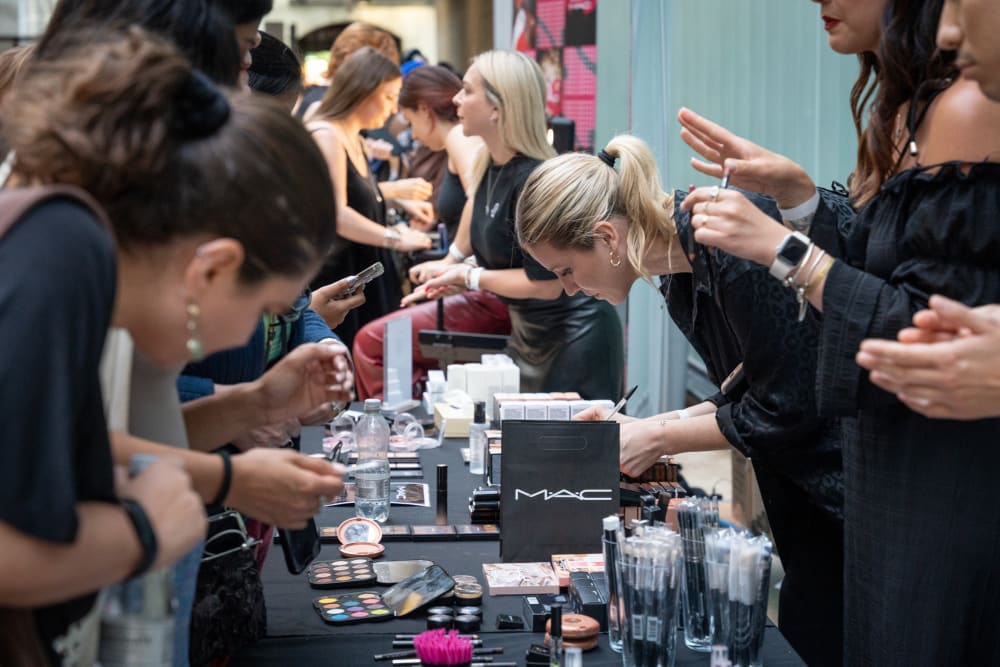 MAC people selling their products to the event guests