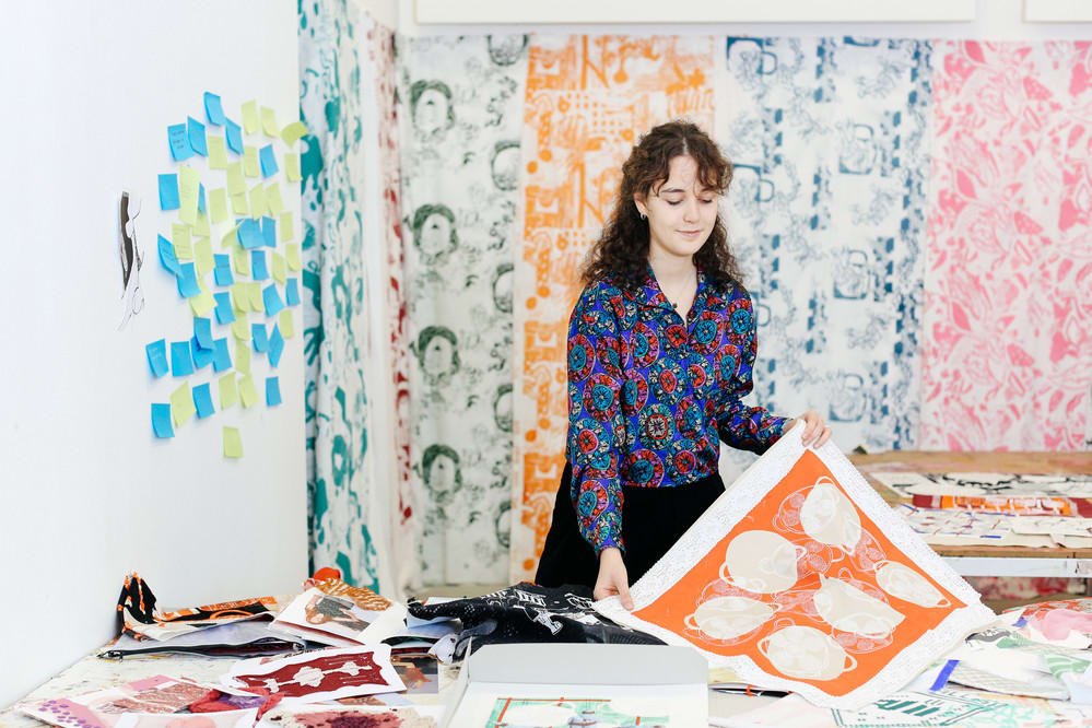 Woman showing her work.
