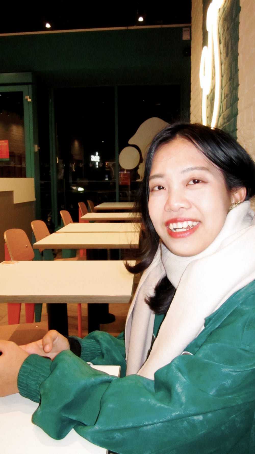a girl smiling for a photo