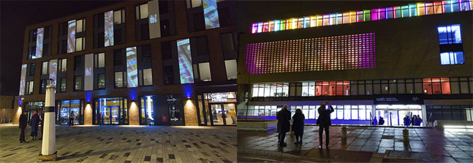 The outside of a building with a colourful lighting installation on the outside.