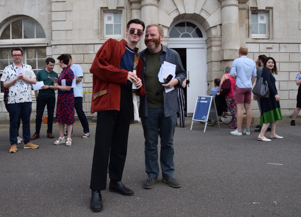 Two men posing for a photo together