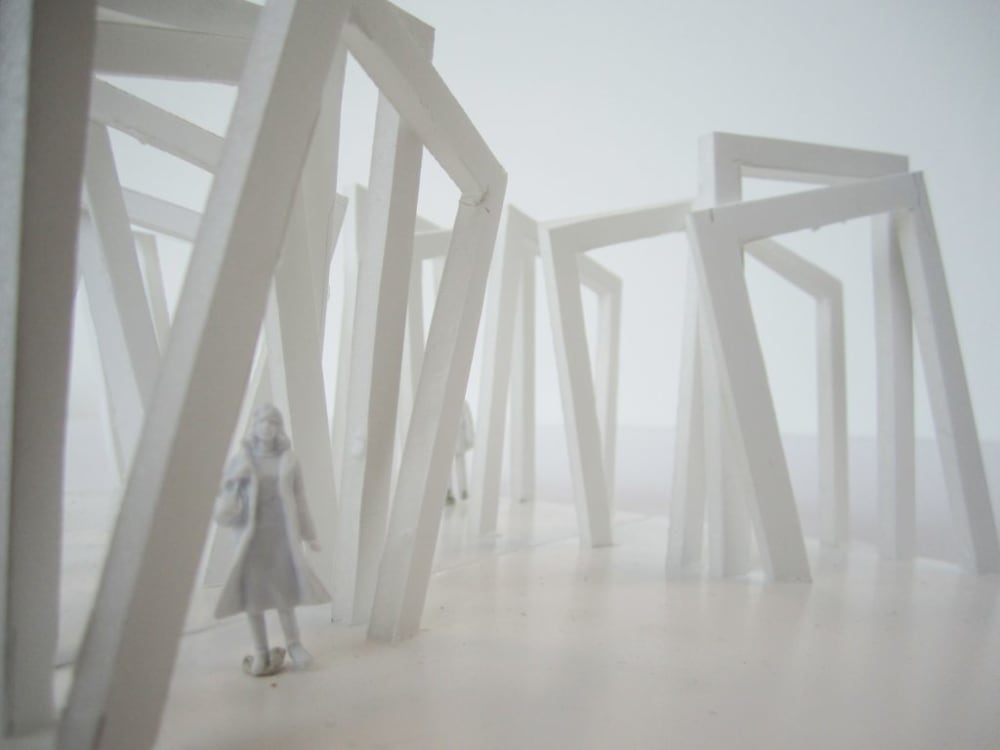 a scale model displaying abstract white structures