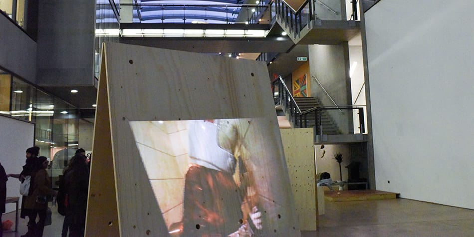 Large wooden board with image projected on to it
