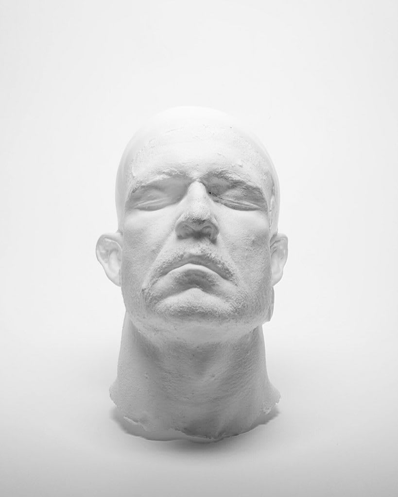 A sculpted male head