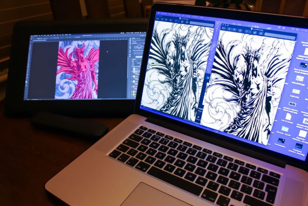 an image of two screens displaying a digital illustration being drawn