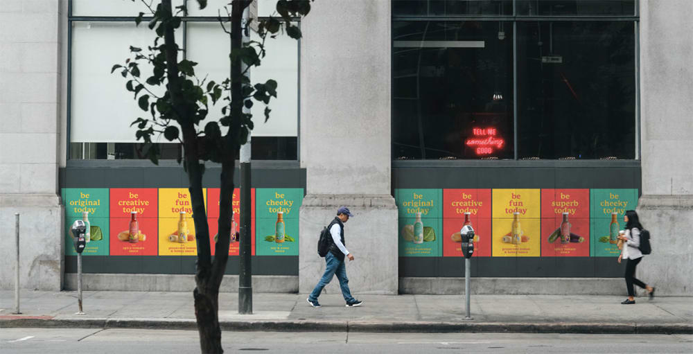 Concept art for brand posters featured on the side of a building.