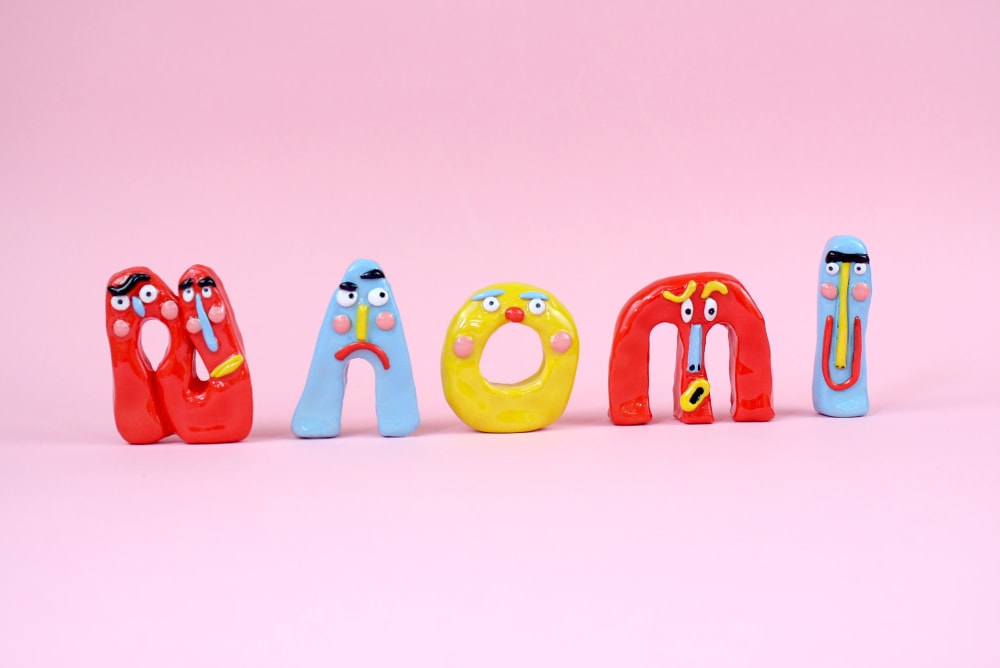 Naomi spelt out in ceramic letters