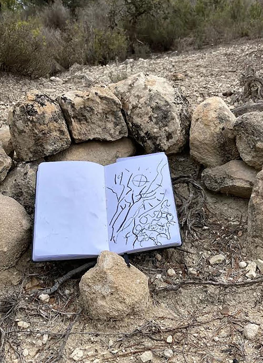 spanish landcape with sketch book