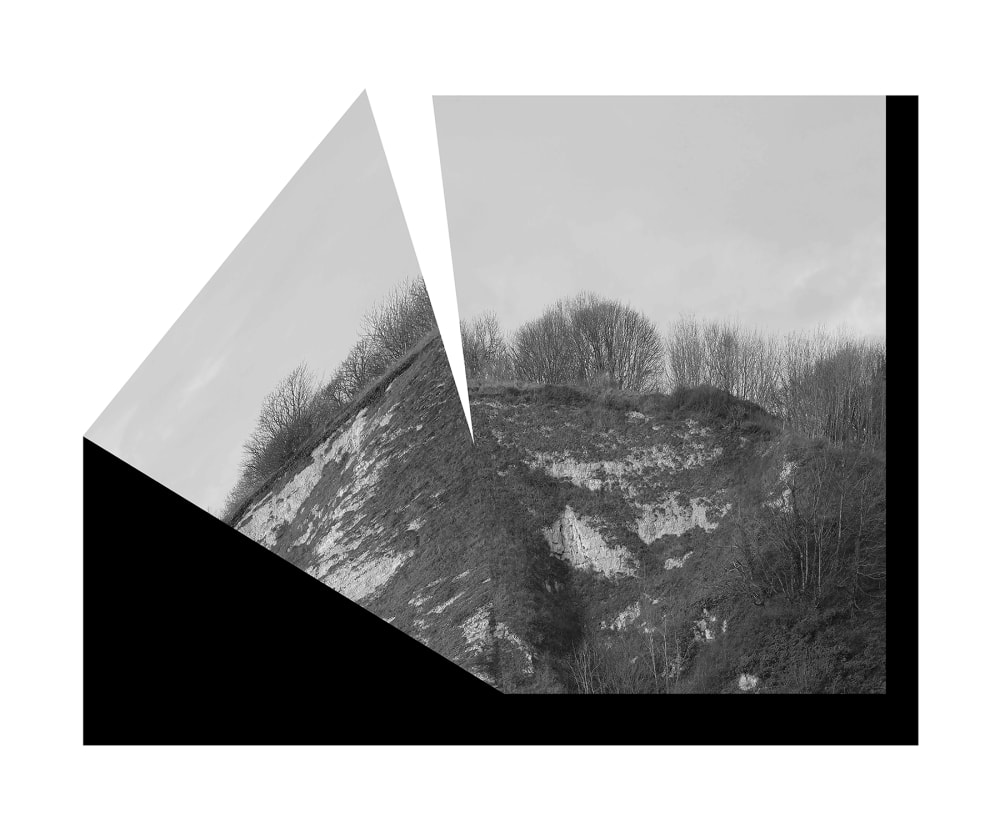 Black and white landscape disrupted by geometrical shapes