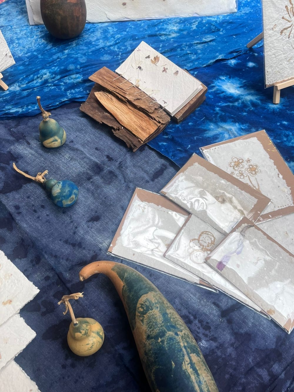 Stallholder showcasing artworks