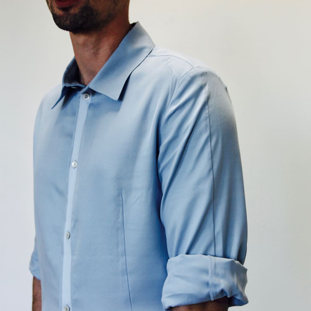 Man wearing blue coat.