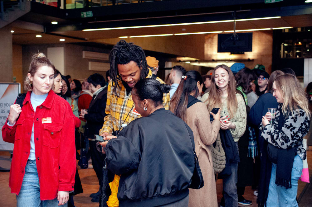 Photo of a group of people chatting