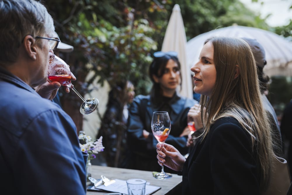 Guests chatting outside 