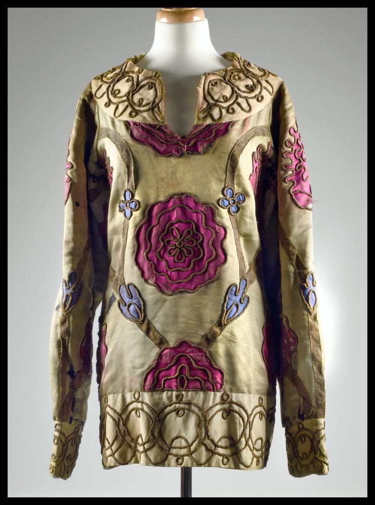 Silk tunic, gold fabric with red floral embroidery.