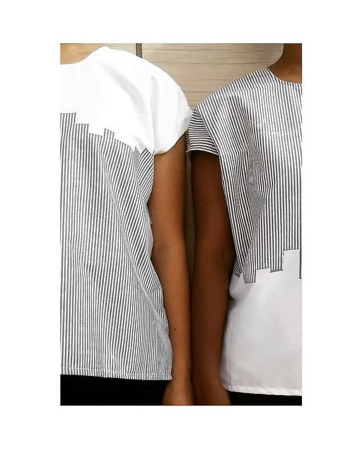 two female models wearing black and white patterned t-shirts