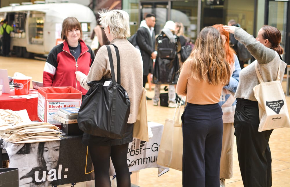 raffle table manned by lady