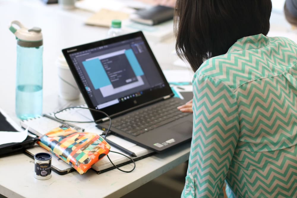 A person working at a laptop