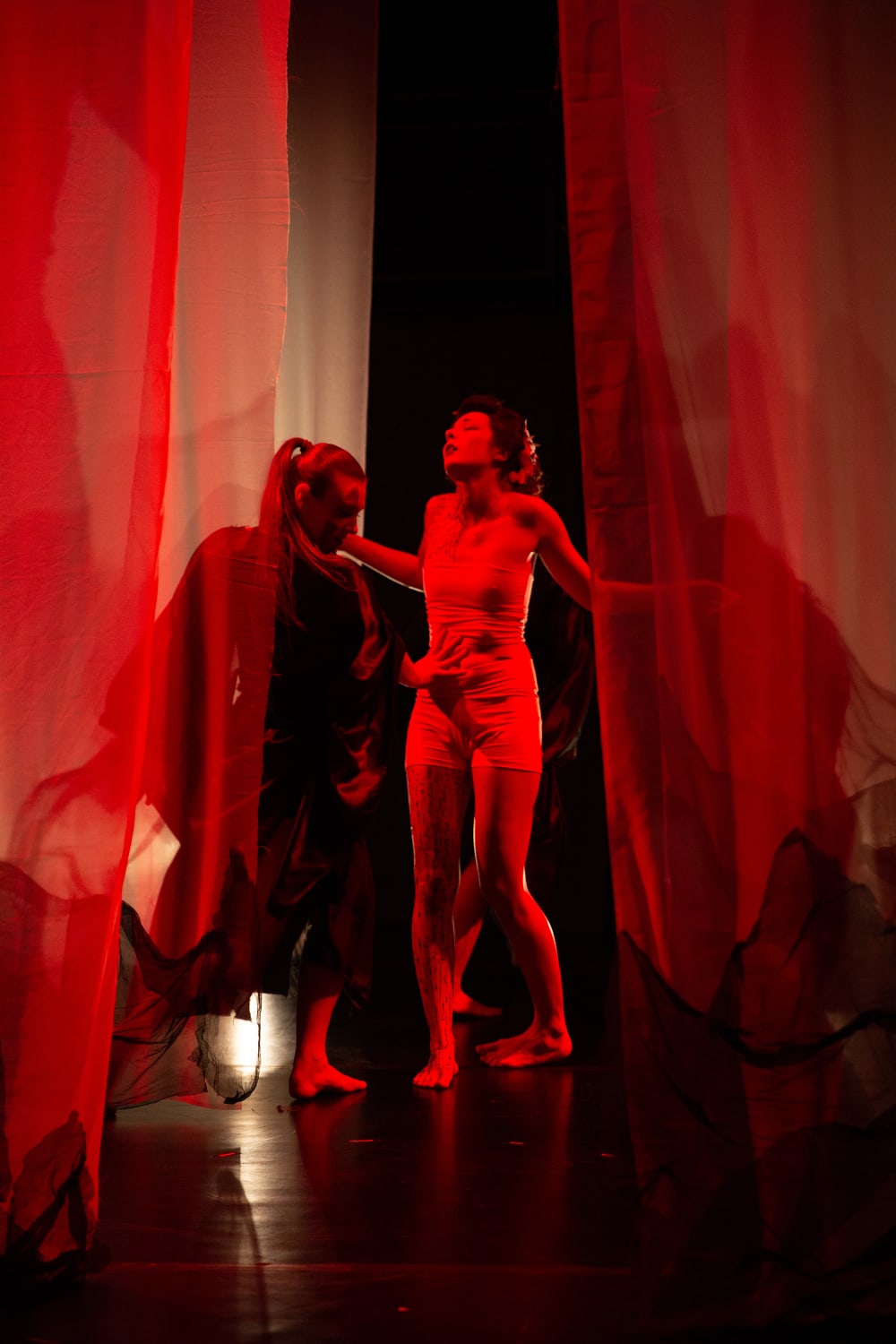 Red stage lighting during performance