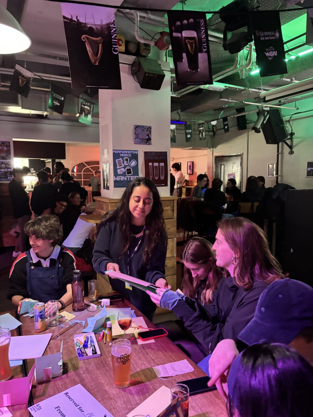 People crafting around a table