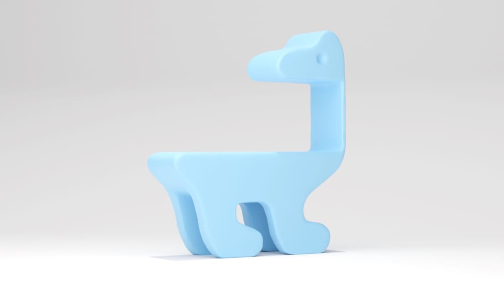 Stylised pale blue toy dinosaur