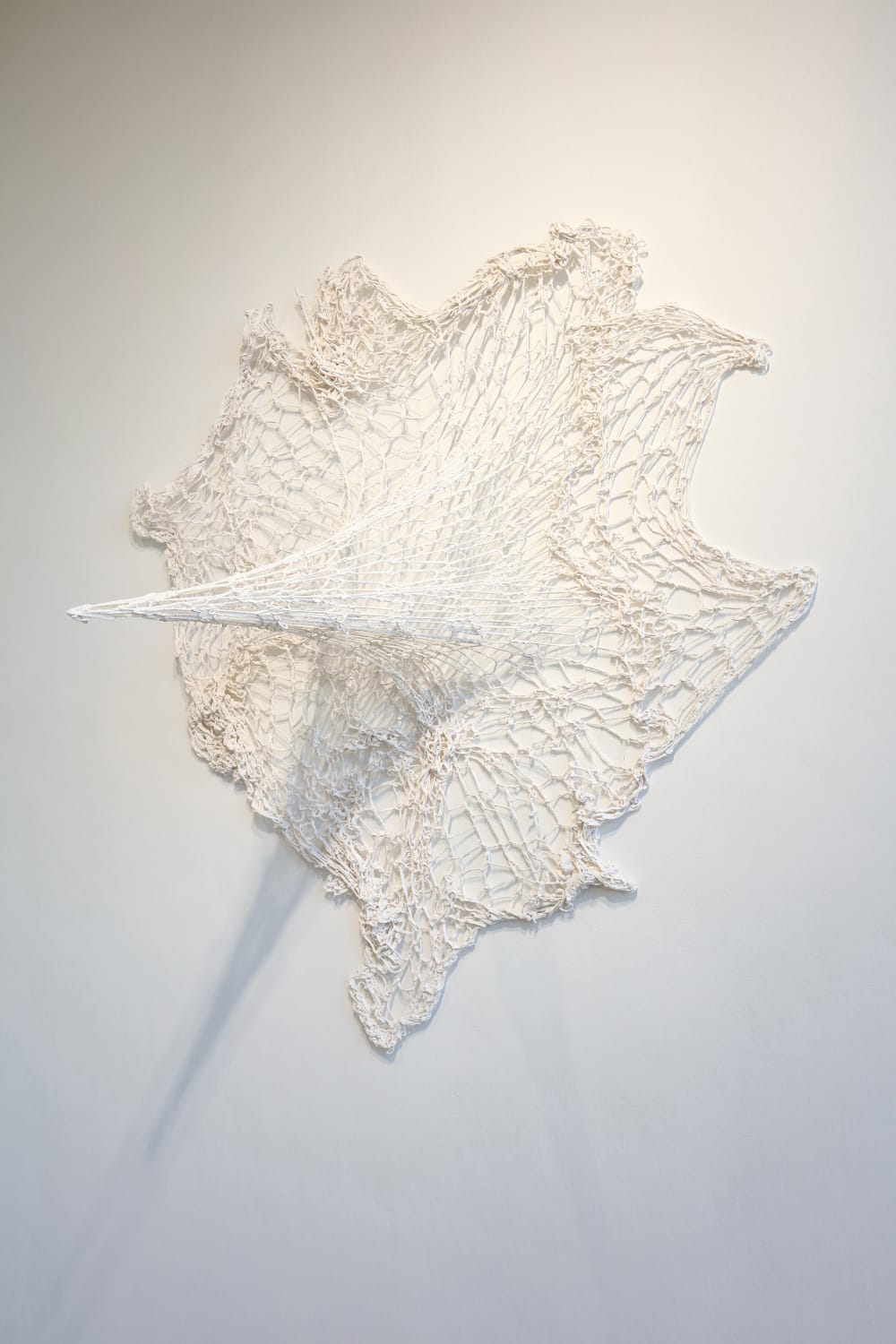installation using plaster and synthetic fibres