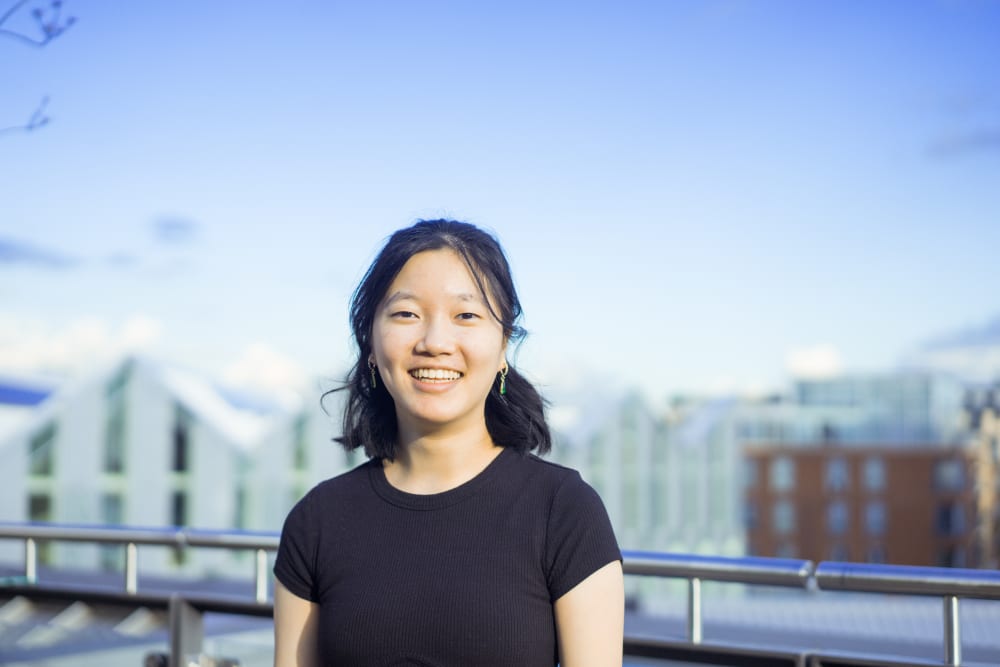 Girl with blue sky background