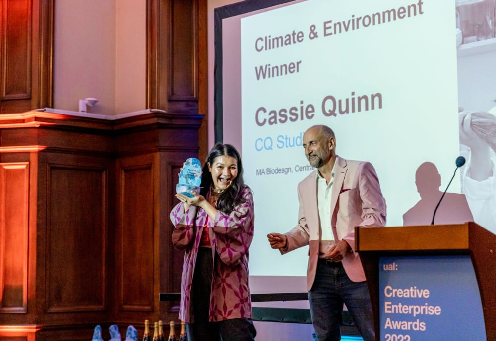 Cassie receiving her award at the UAL Creative Enterprise Awards 2022