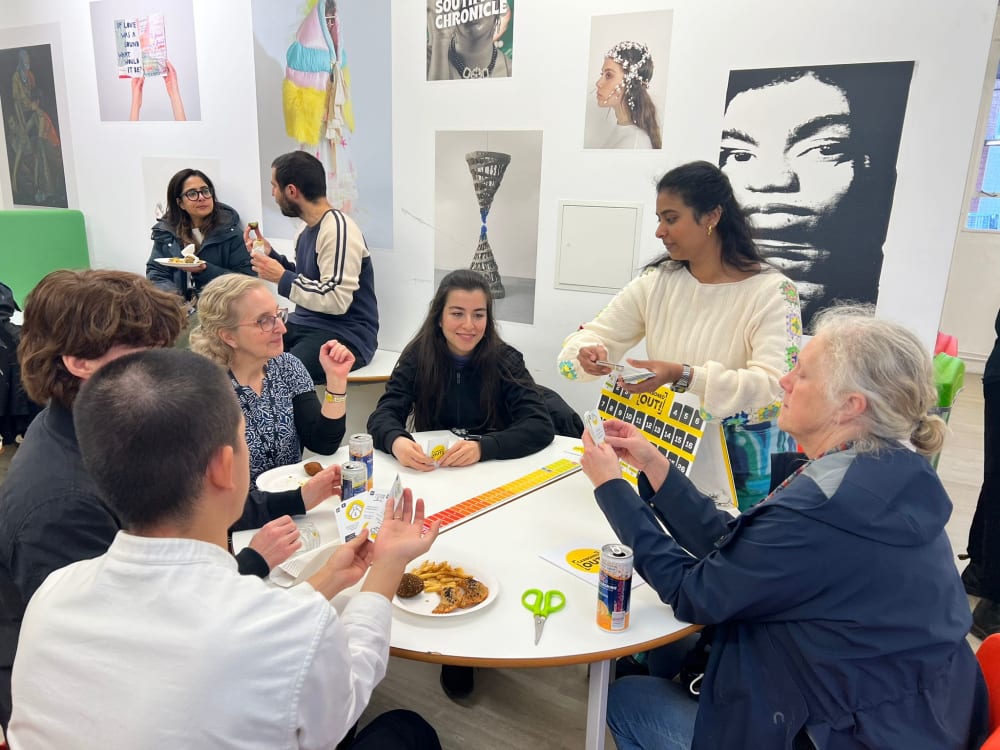Students gathered around a workshop