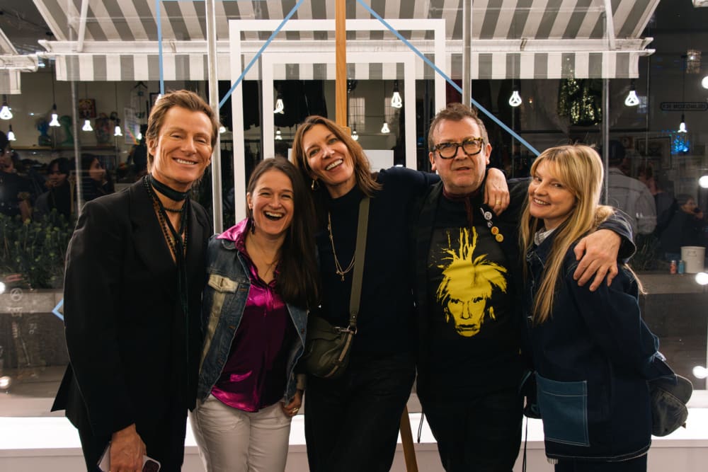 5 people smiling at camera. 