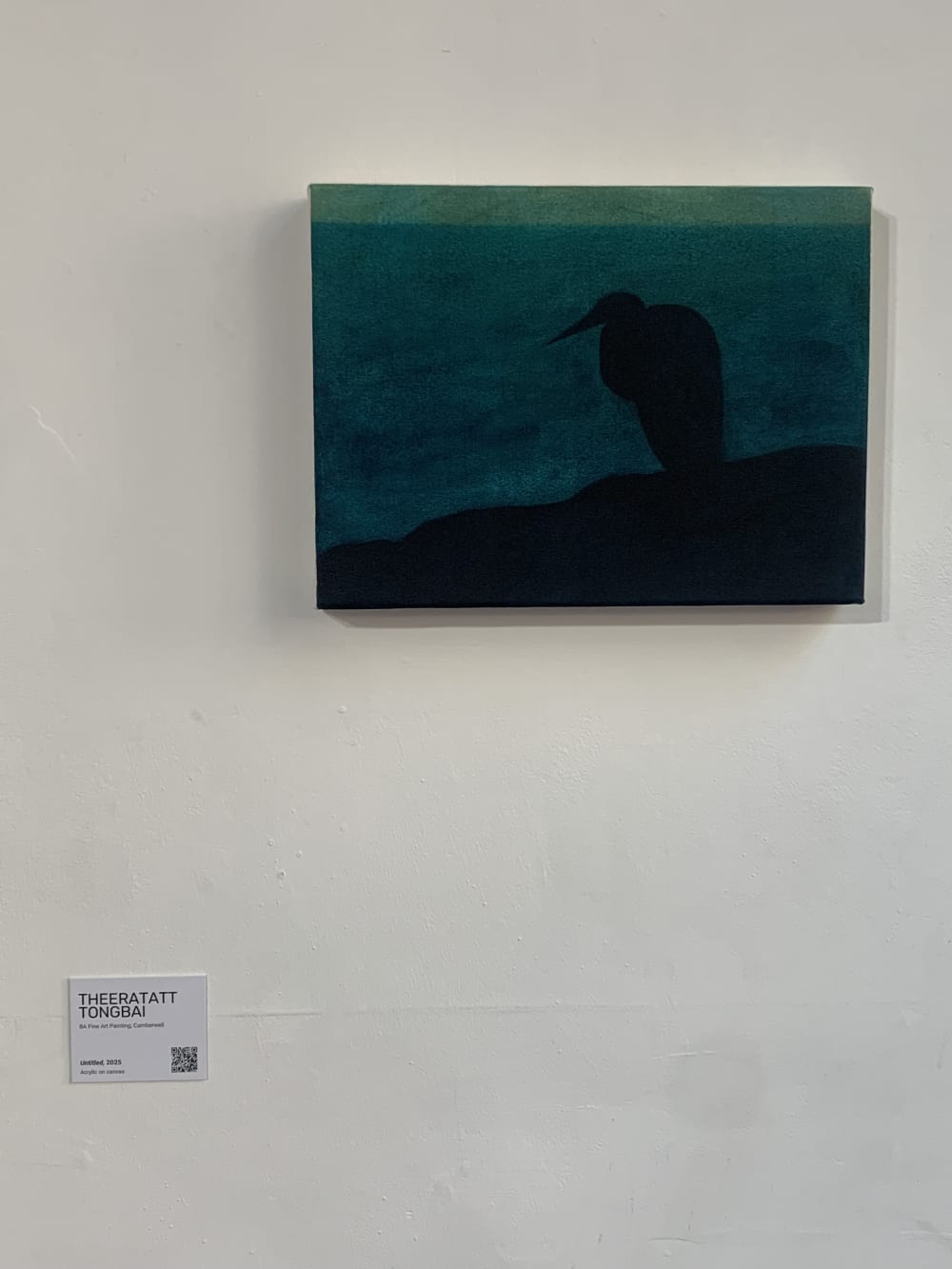 Painting of a black bird on a dark blue green background