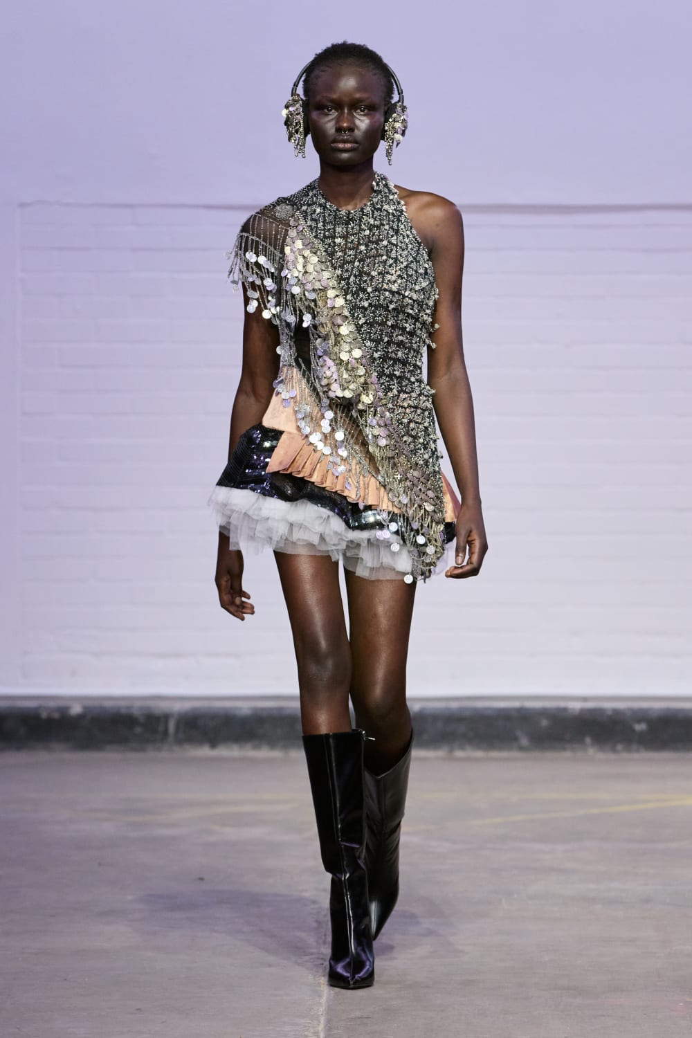 An image of a model on the runway