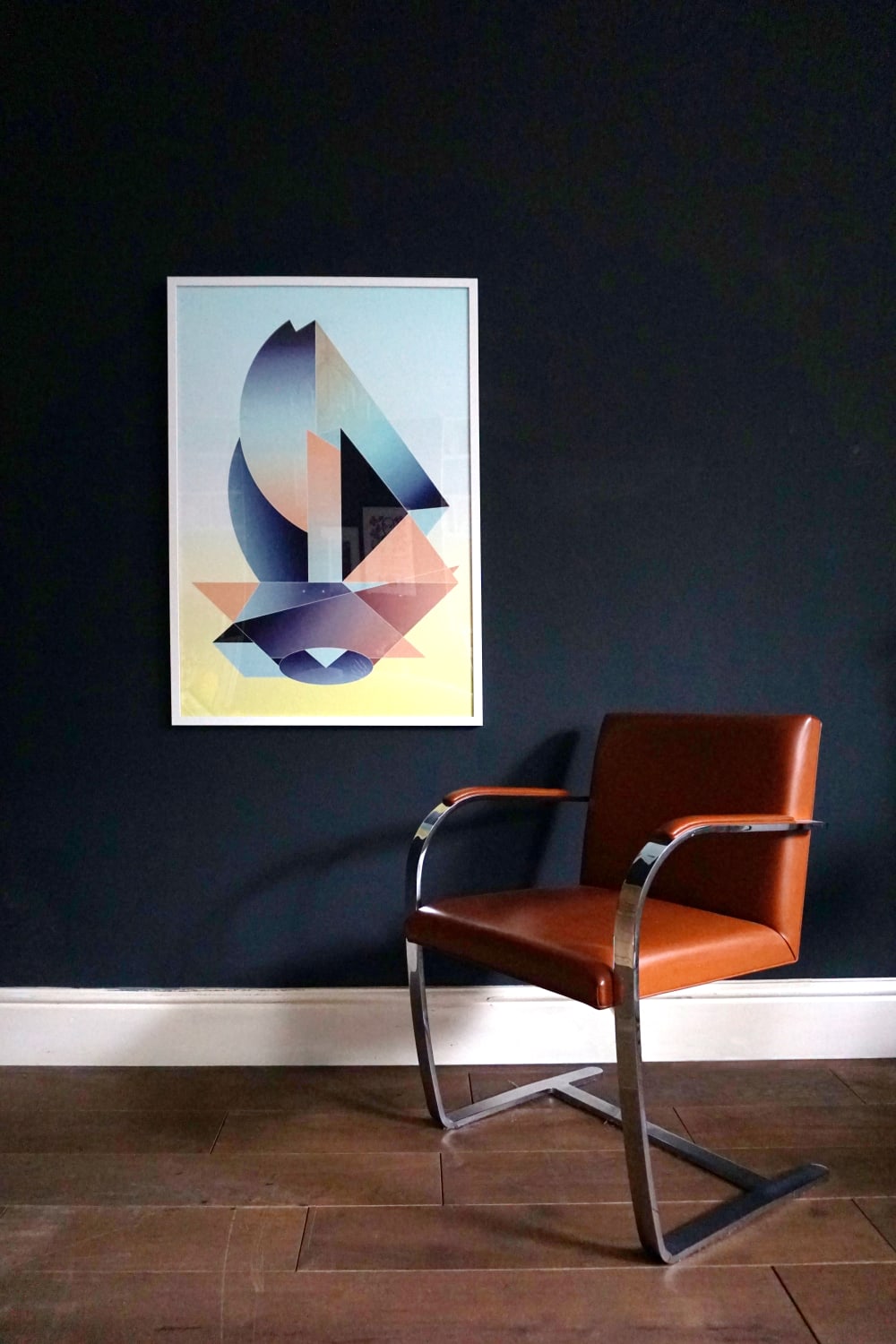 Camila's work to the left of a chair