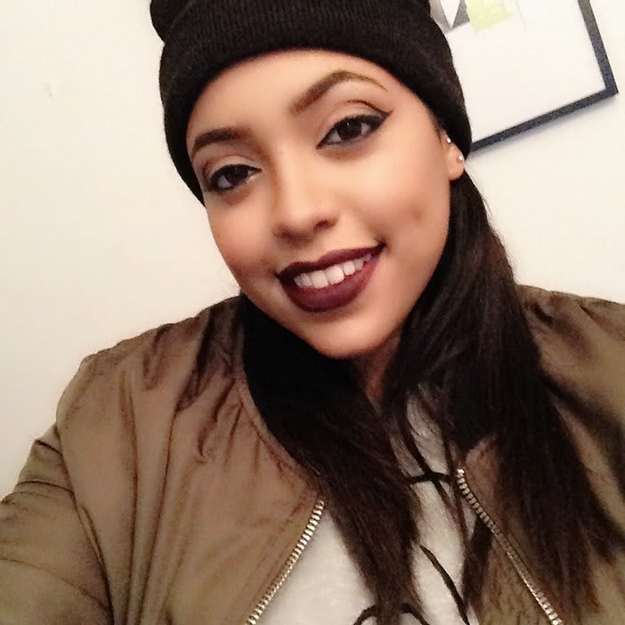 Close-up of a woman smiling into the camera