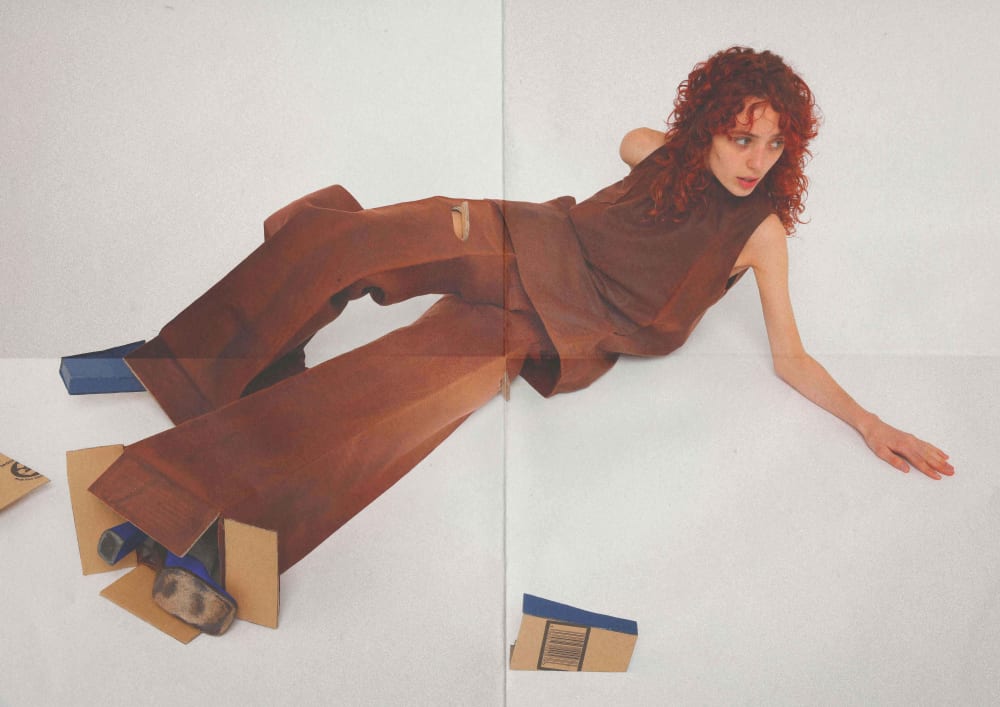 Woman wearing brown cardboard