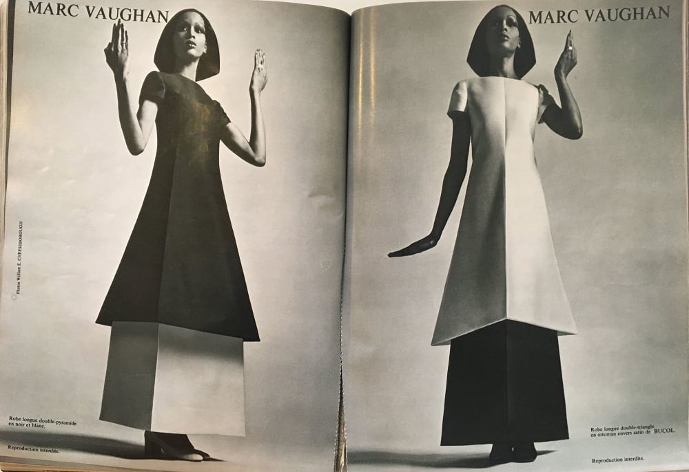 A double page editorial from the L’Officiel de la Mode. Left and right page shows same model posing with different hand gestures. Model wears identical box shaped dress and blouse in both pictures. 