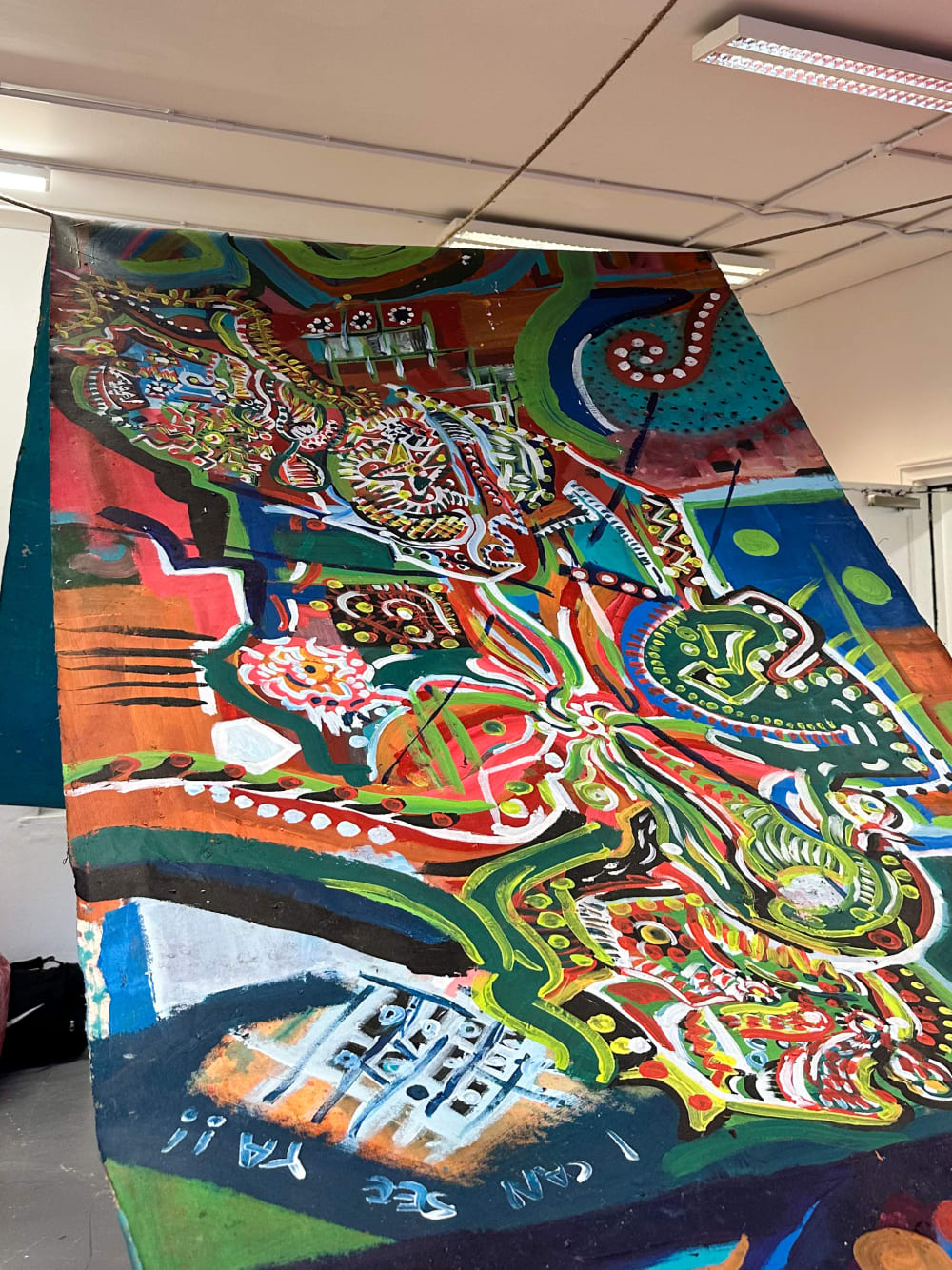  a large painted piece of fabric