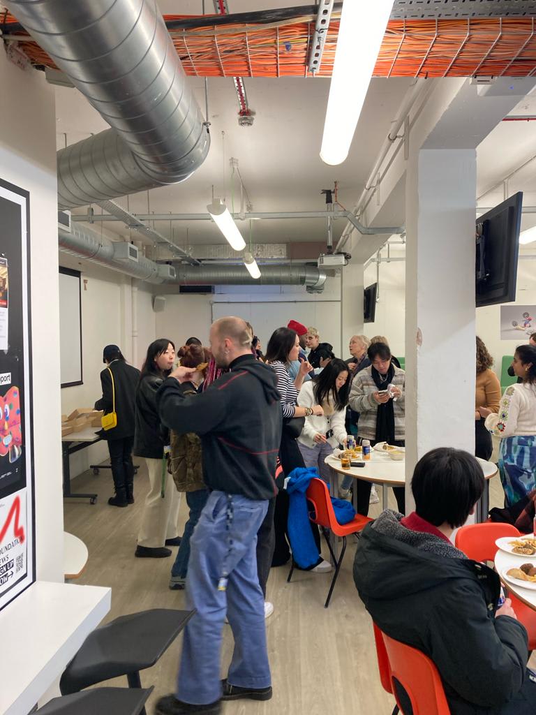 Students gathered around a lunch buffet at CSM