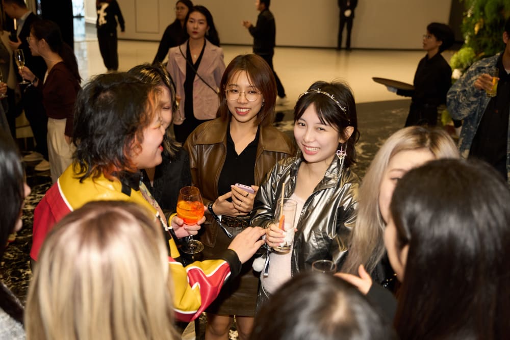Group of people standing and talking