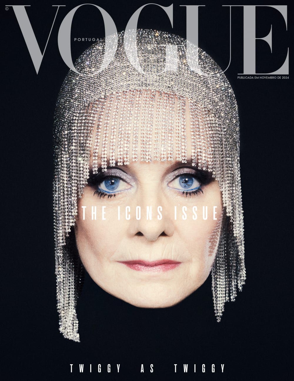 Vogue Portugal cover with model Twiggy Lawson's face wearing a 20s flapper cap.