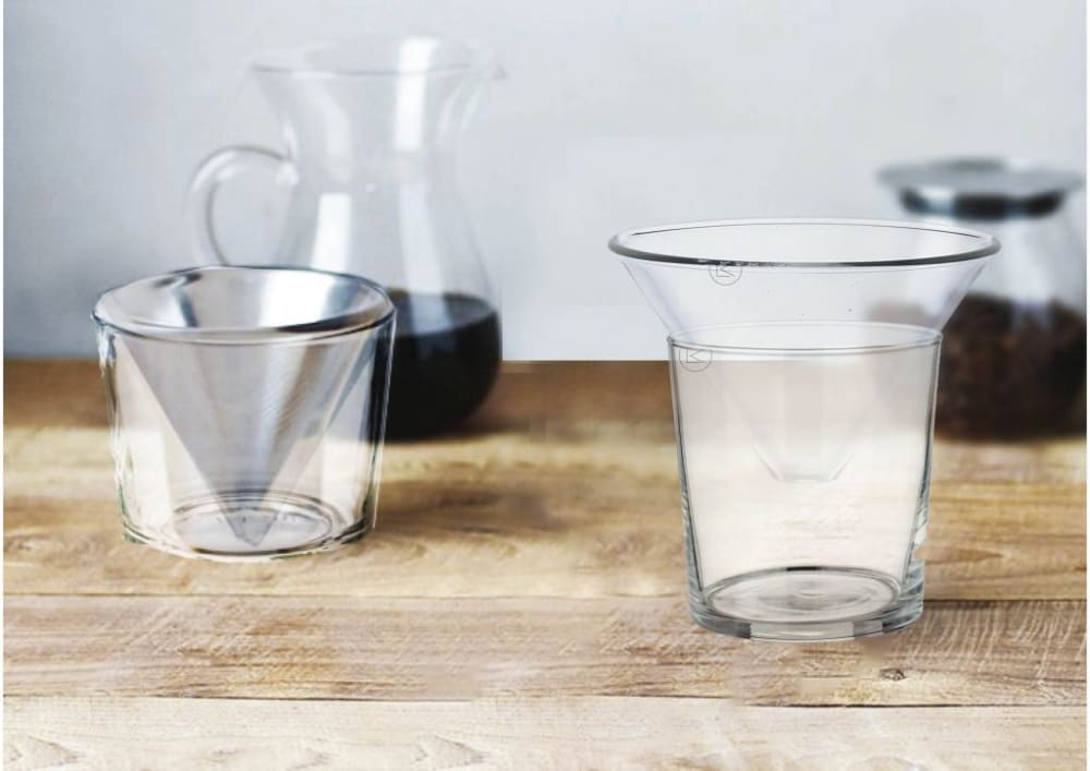 An image of two glasses with funnels in